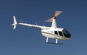 Met de R66 turbinehelikopter hoveren op 10.000ft